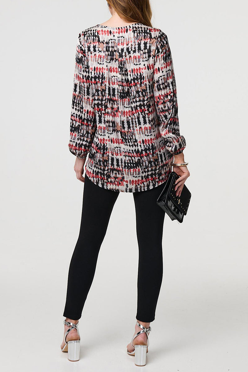 CORAL | Printed Asymmetric Long Sleeve V-Neck Top